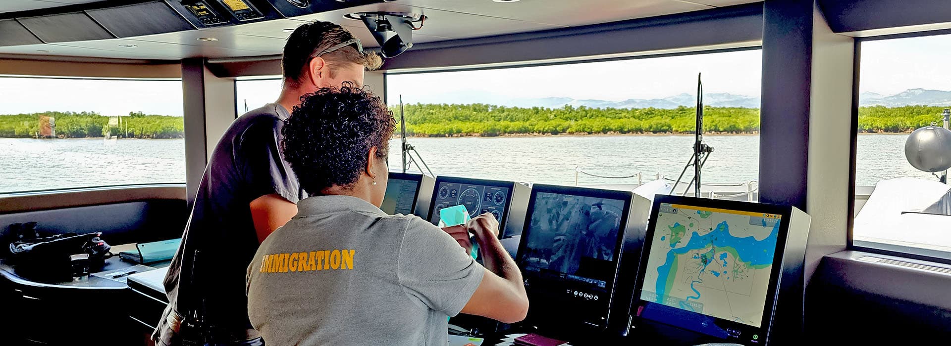 Fiji Immigration officers conducting port security checks aboard a vessel